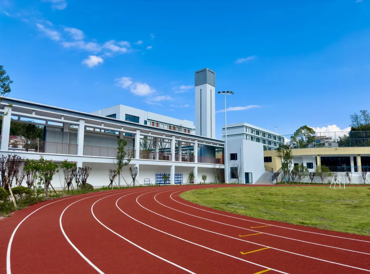 The running track with the school block behind it